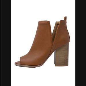 Tan booties from pink lily. Brand new